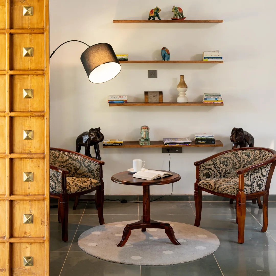 Living room with elegant furnishings inside the private villa in Coorg