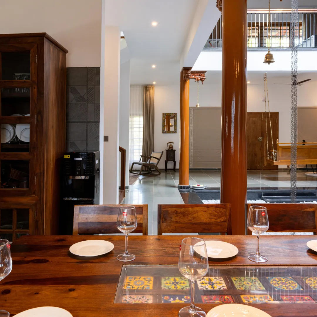Dining table setup inside the private villa in Coorg