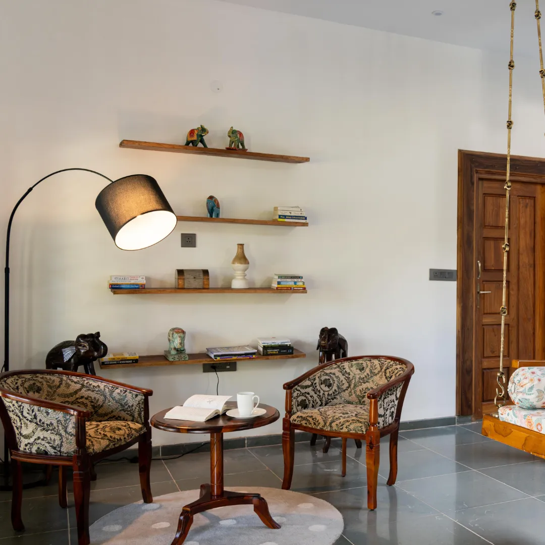 Premium seating area inside the plantation villa in Coorg