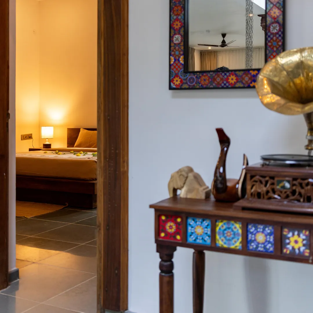 Comfortable seating area overlooking the villa courtyard in Coorg