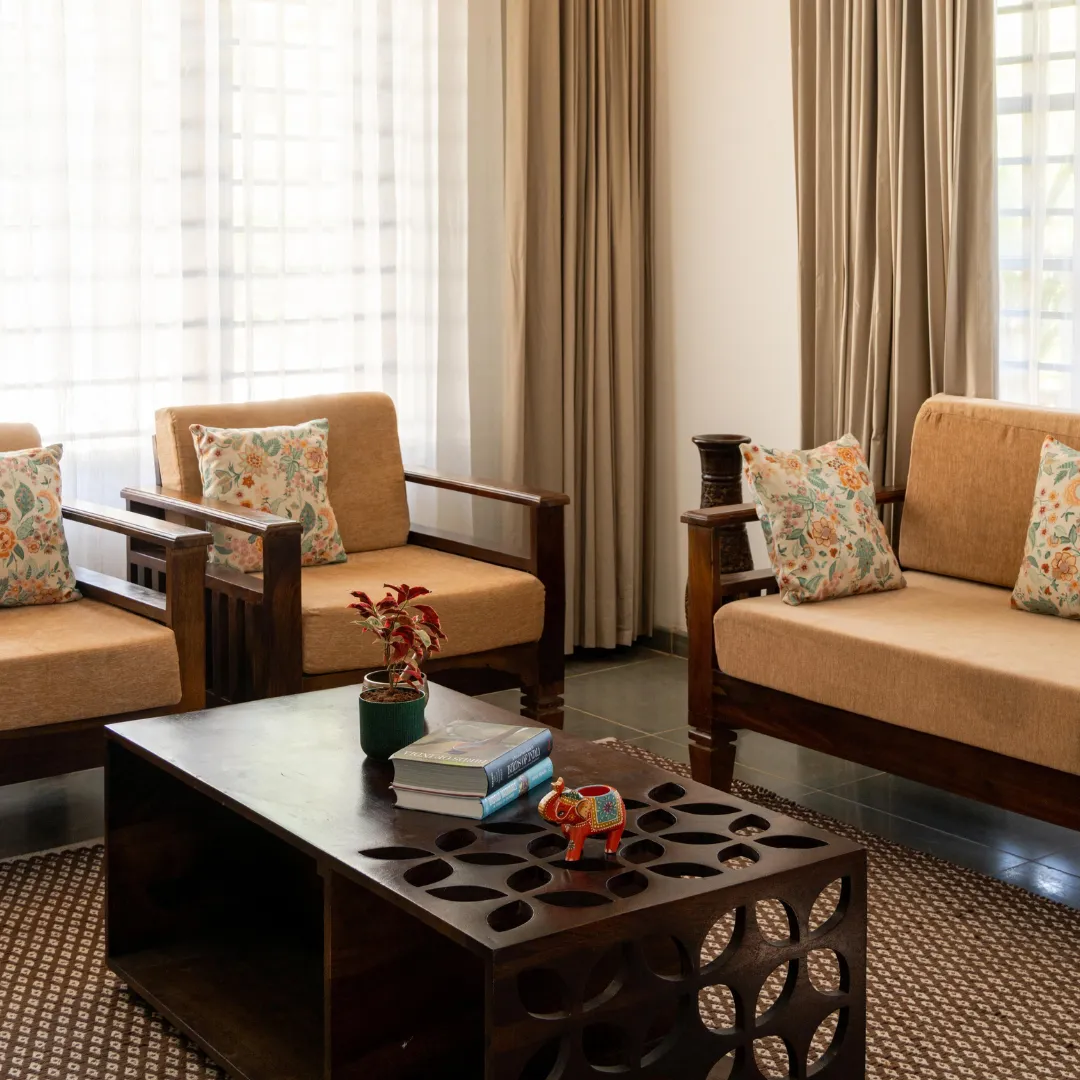 Comfortable lounge area inside the luxury villa in Coorg